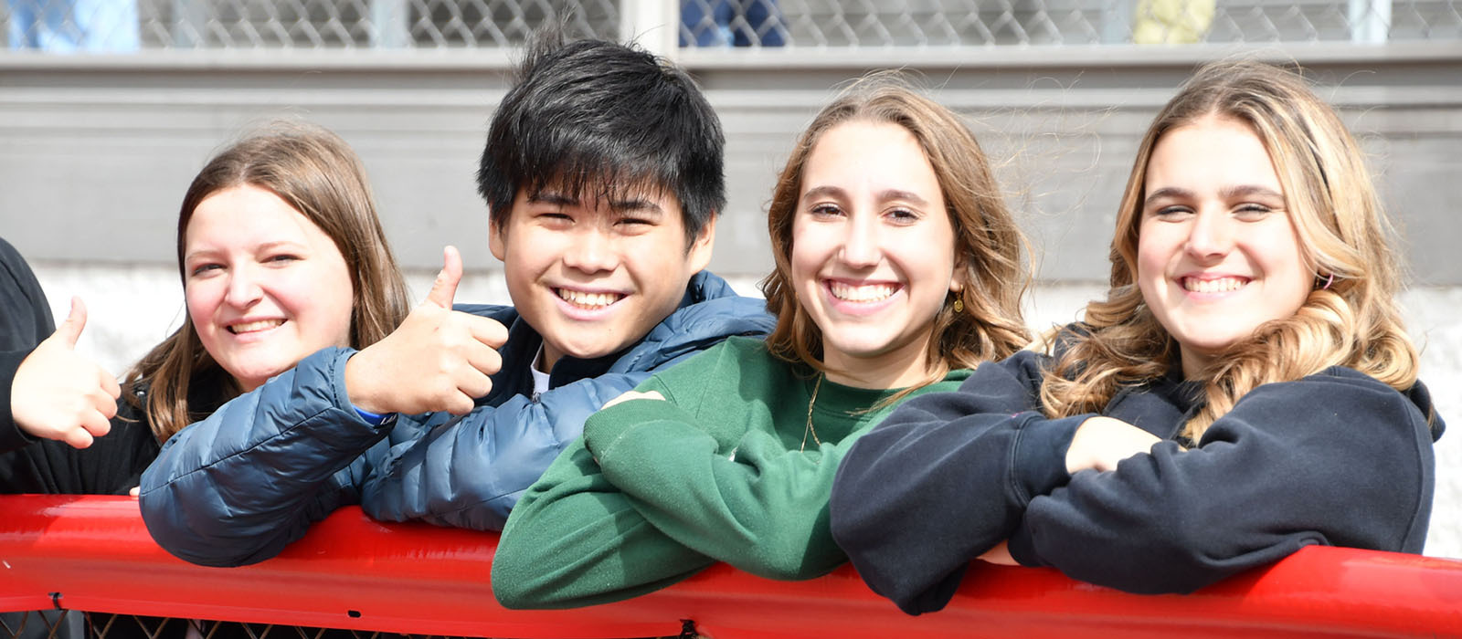 Students cheering for our Powder Puff Football team